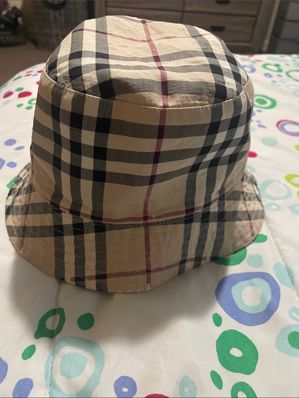 Burberry Beige Plaid Bucket Hat with Black and Red Accents